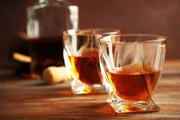 Whiskey on wooden background