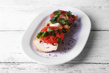 Tasty sandwich with vegetables and cheese