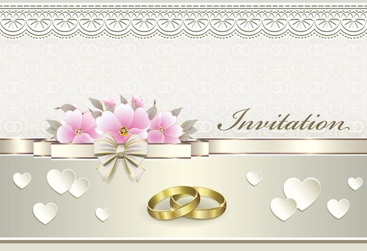 wedding card with rings and pink flowers