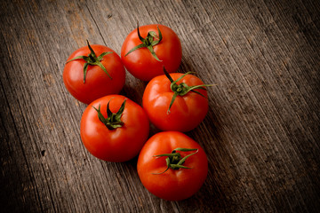Tomatoes on wooden table