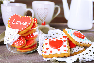 Heart shaped cookies for valentines day, teapot and cups