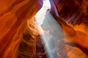 Fotobehang Canyon Rays of Sunlight Coming from Ceiling in Antelope Canyon