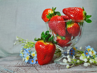 fresh strawberries in a glass dish