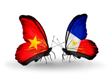 Two butterflies with flags Vietnam and Philippines