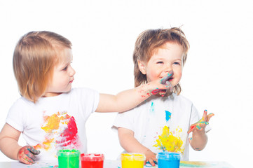 Children playing with finger paints