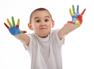 cheerful child with painted hands on white background