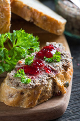 chicken liver or goose pate on wholegrain bread and cranberry