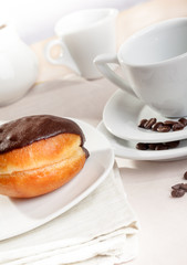 Chocolate donut on plate