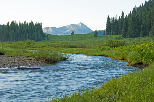 Cool Blue River In Spring In Colorado.