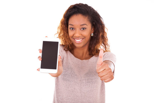 African American Woman Showing A Mobile Phone And Making Thumbs