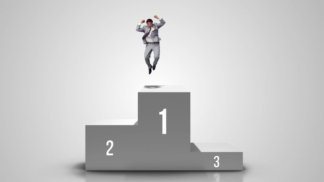 Businessman cheering on first place posium