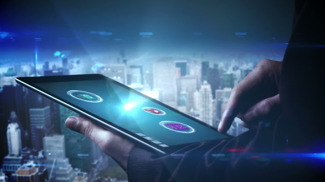 Businessman using tablet to view holographic apps