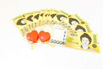 Korea money with twin heart on white background
