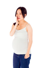 Pregnant asian woman isolated on white talking shouting