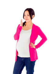 Pregnant asian woman isolated on white fingers crossed for luck