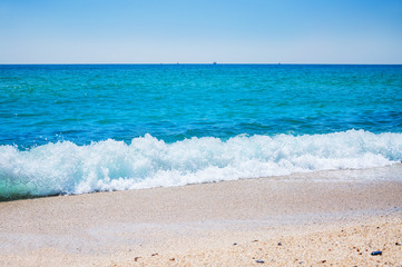 Fototapeta na wymiar Tropical beach with white sand and blue sea