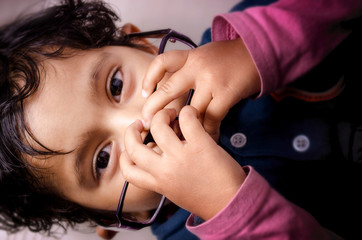 Portrait of child wearing glasses