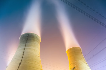 cooling towers at night