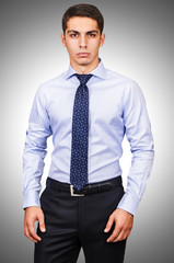 Male model with shirt isolated on white