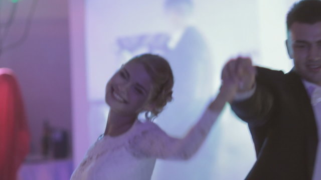 Newlyweds dancing their first dance