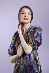 Attractive asian female touching her hair