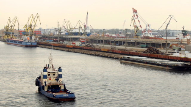 tugboat floats in the port