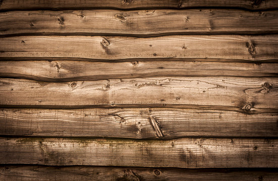 wooden wall background with black vignette borders