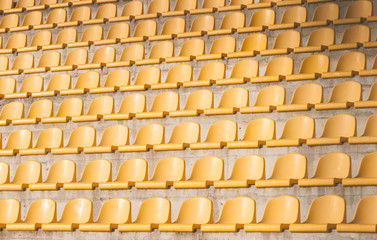 yellow chairs on the soccer field