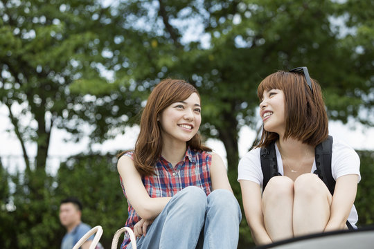 Two young women in the park. 