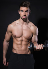 Fototapeta na wymiar handsome young bodybuilder