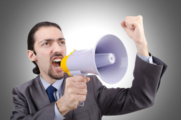 Man shouting and yelling with loudspeaker