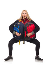 Fototapeta premium Young woman student with backpack isolated on white