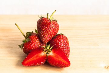 Fresh strawberry on wood.
