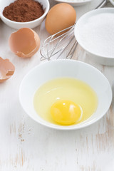 ingredients for baking on a white table, vertical