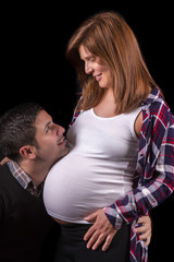 Close view of a expecting pregnant couple 