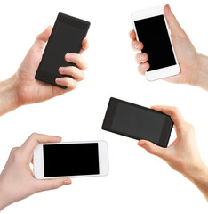 Hands holding smartphones isolated on white