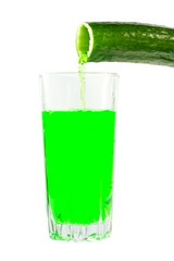 Cucumber juice is poured into a glass
