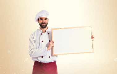 Chef holding empty placard