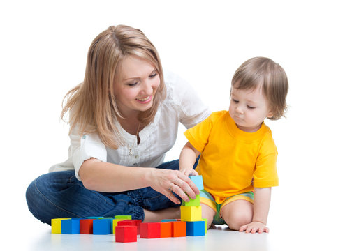 Child Boy With Mom Playing Wooden Toys