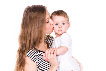 Beautiful baby and mother playing