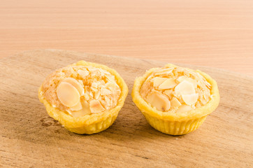Almonds tart on wooden board