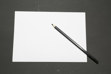 Template blank sheet of paper and black pencil