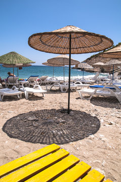 Straw umbrella on a beach.