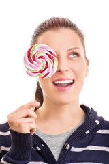 Young girl holding a lollipop