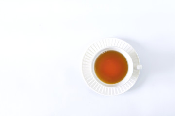 The white cup tea on the white background