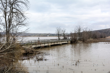 Fototapeta premium Flood - a natural phenomenon. Spilled lake submerged fields.