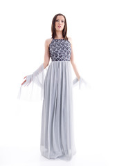 Beautiful woman in a gray dress