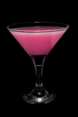 Cocktail in glass on black background isolated.