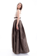 Beautiful woman in a brown dress