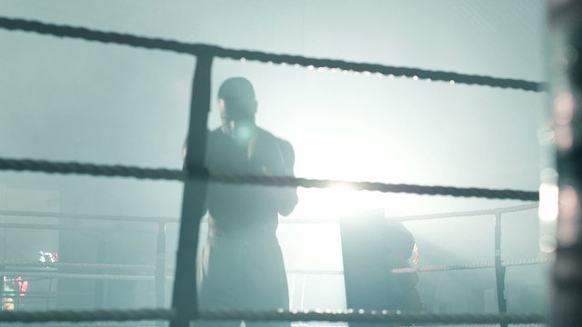 Low Angle MLS of Male Boxer preparing for the fight